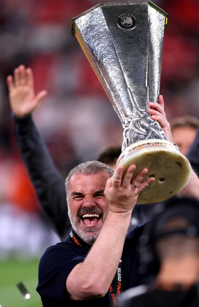 Postecoglou celebrates with the UEFA Europa League trophy. Picture: Ryan Pierse