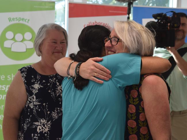 Cid Harbour shark attack survivor Justine Barwick embraces Dr Tina Moriaty, who held her hand as she was being wheeled in to theatre.