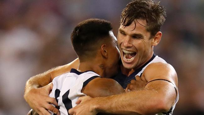 Tom Hawkins celebrates a goal with teammate Tim Kelly on Friday. Picture: Michael Willson. 