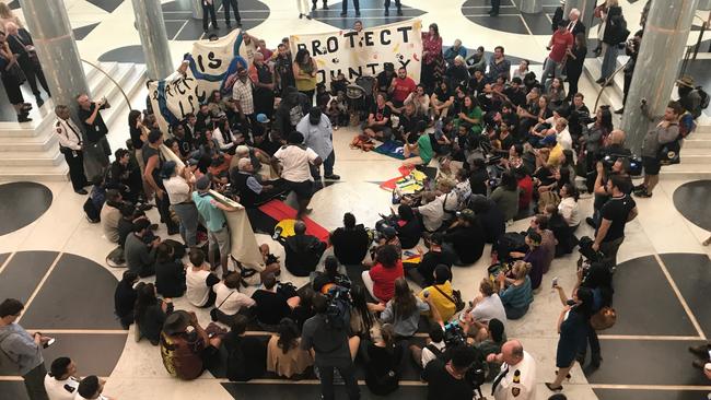 Protesters inside Canberra's Parliament House foyer. Picture: Gary Ramage