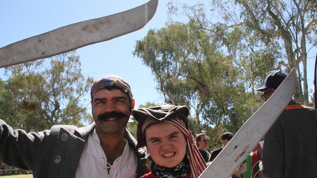 Pirates Nick and Luella enjoying the Henley on Todd in Alice Springs, Saturday, August 17, 2024. Picture: Gera Kazakov