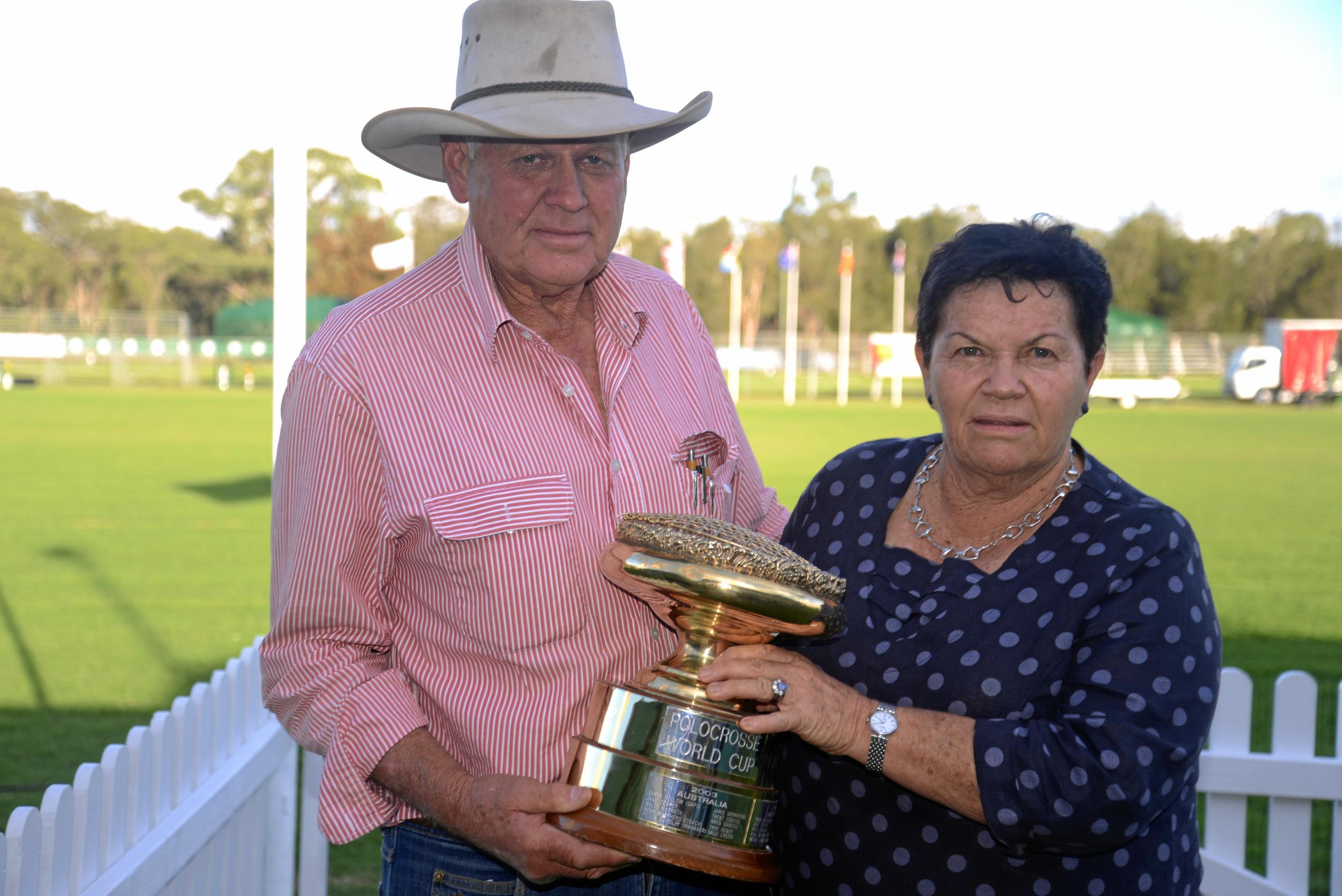 Warwick Polocrosse Club president Les Fraser and treasurer Robyn Fraser with the World Cup. Picture: Gerard Walsh