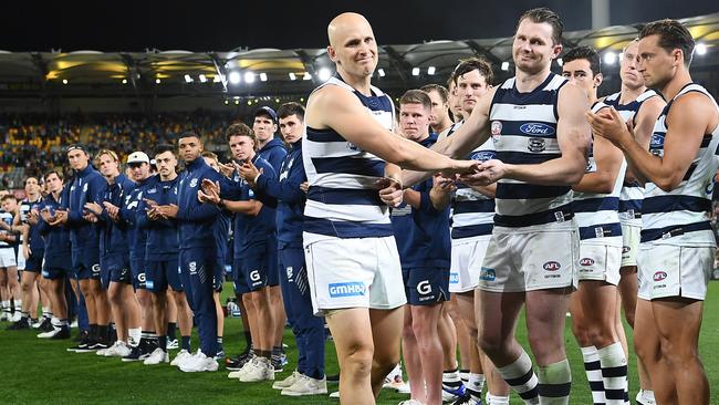 Gary Ablett shakes hands with star teammate Patrick Dangerfield after his last match.