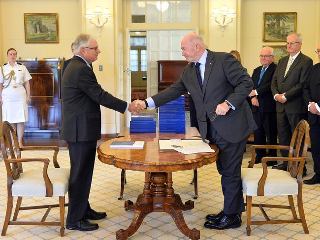 Commissioner Justice Peter McClellan (left) and the Governor-General of Australia Peter Cosgrove at the signing ceremony and the release of the Final report of the Royal Commission into Institutional Responses to Child Sexual Abuse at Government House, Canberra, 15 December, 2017. Photo: Jeremy Piper