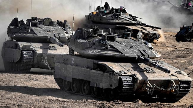 Israeli tanks on the move along the border with the Gaza Strip. Picture: AFP