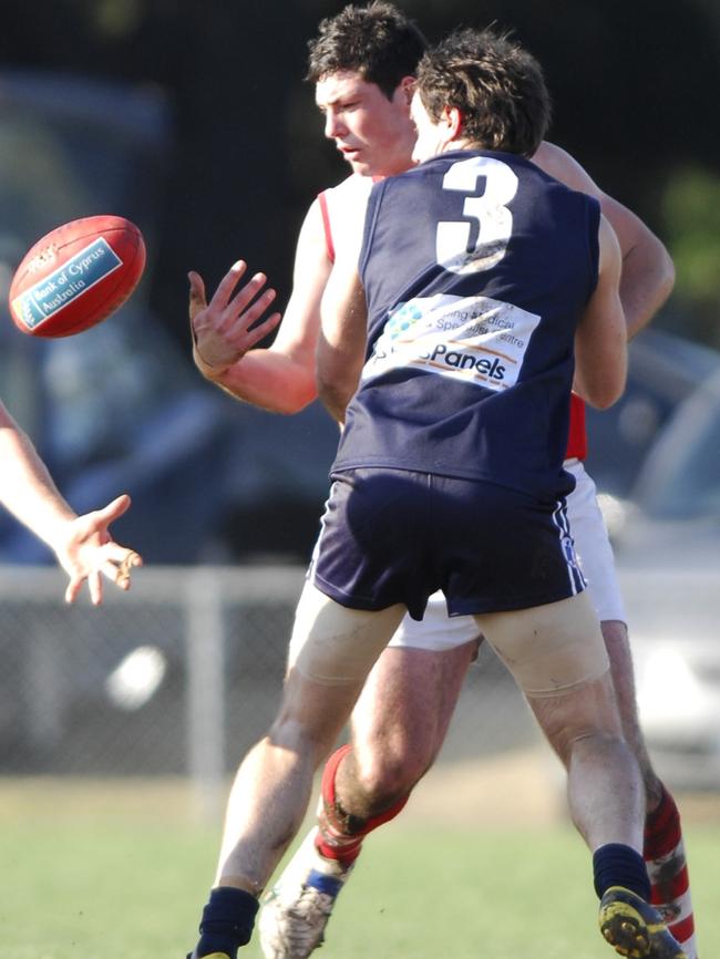 Aaron Johnson lays a tackle during his playing career with Epping.