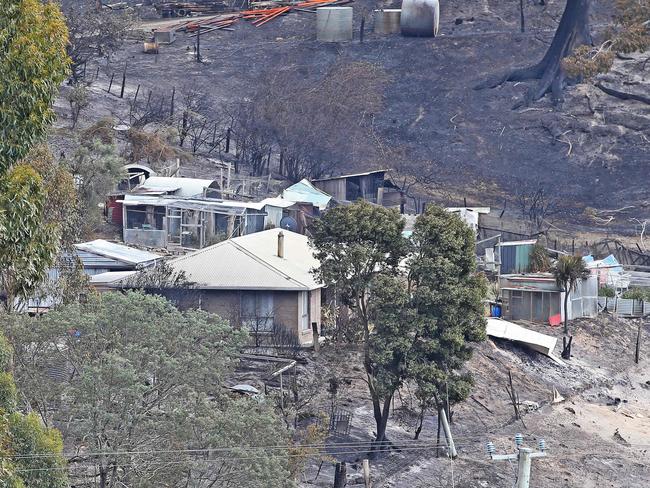 Damaged properties at Pelham. Picture: ZAK SIMMONDS