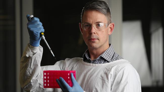 Professor Nathan Bartlett from Hunter Medical Research Institute helped developing the nasal spray that stops the virus that causes COVID-19 and will also prevent the common cold and influenza. Picture: David Swift