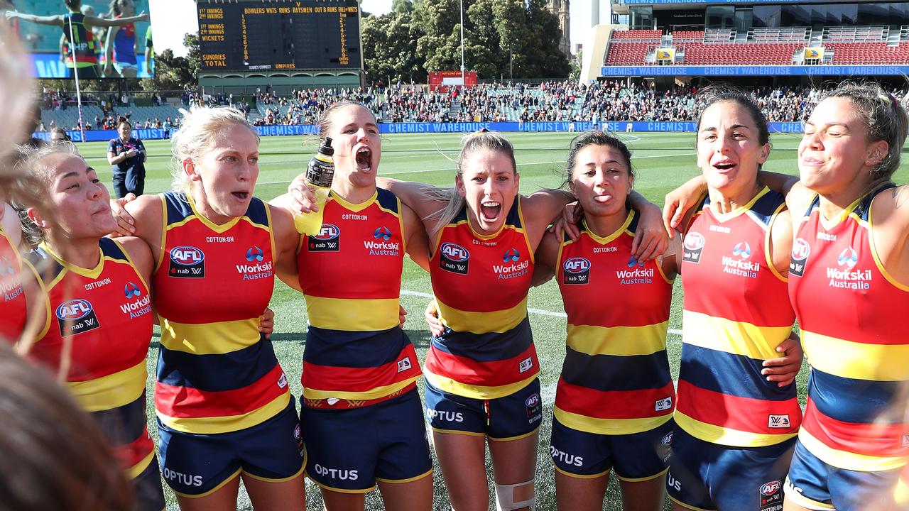 Crows players sing the club song after the win. Picture: Getty Images