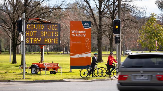 A sign erected in Wodonga Place in Albury telling people to stay home. Picture: Simon Dallinger