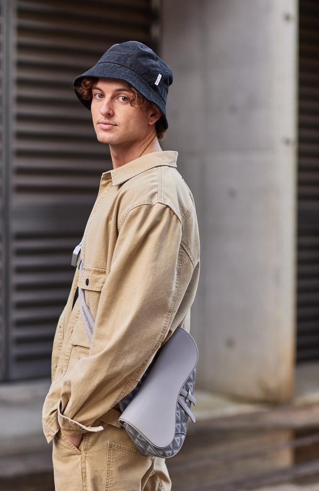 Cameron Robbie wearing Dior Saddle Bag Greige CD Diamond Canvas and Smooth Calfskin, $4900, Dior Men’s Pop-Up QueensPlaza, Brisbane City.