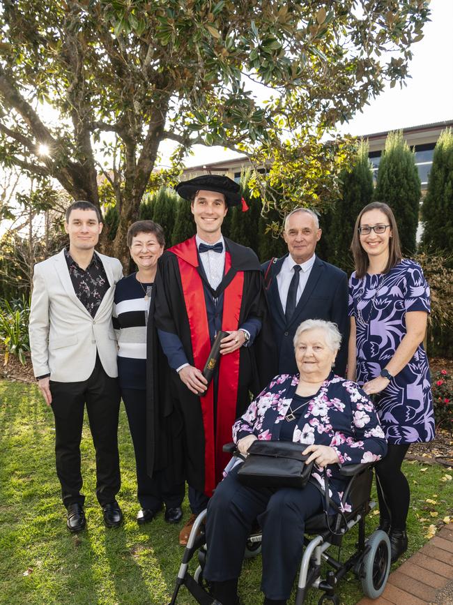 Doctor of Philosophy graduate Peter Gregor with family (from left) David Gregor, Jolan Gregor, Steven Gregor, Jolan Pajkos and Christina Gregor at a UniSQ graduation ceremony at Empire Theatres, Wednesday, June 28, 2023. Picture: Kevin Farmer