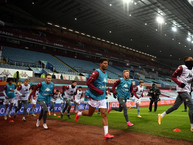 BIRMINGHAM, ENGLAND - JANUARY 08: Callum Rowe of Aston Villa warms up with team mates prior to the FA Cup Third Round match between Aston Villa and Liverpool at Villa Park on January 08, 2021 in Birmingham, England. The match will be played without fans, behind closed doors as a Covid-19 precaution. (Photo by Shaun Botterill/Getty Images)