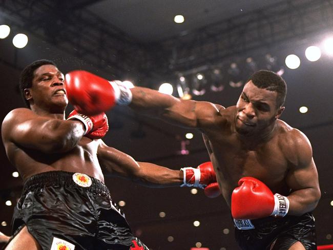 Mike Tyson (right) would still be a terrifying prospect today.