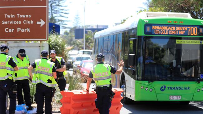 22nd December 2020, Griffith Street Coolangatta, Gold Coast . Queensland Police stop and check buses trying to enter Queensland from NSW through Tweed Heads after QLD closed its borders to Sydney Residents due to other major Covid breakout.Photo: Scott Powick Newscorp