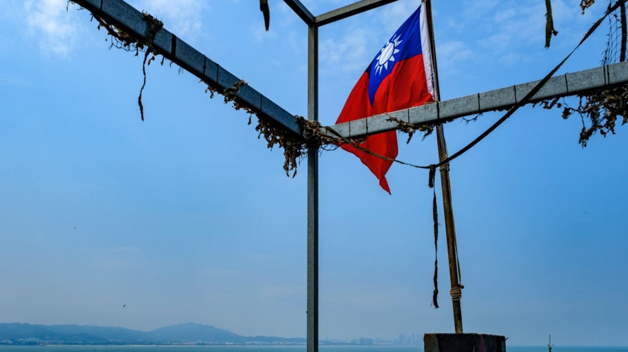 Taiwan’s flag flutters on Kinmen, in the shadow of China. Alberto Buzzola/LightRocket via Getty Images)