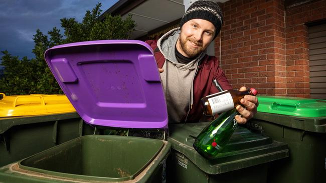 Williamstown resident Jacob Matray with a new purple lid bin. Picture: Mark Stewart