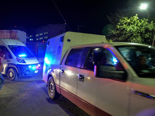 An ambulance carrying the remains of Hector Beltran Leyva, leader of the Beltran Leyva's drug cartel, leaves the prison where he died. Picture: AFP