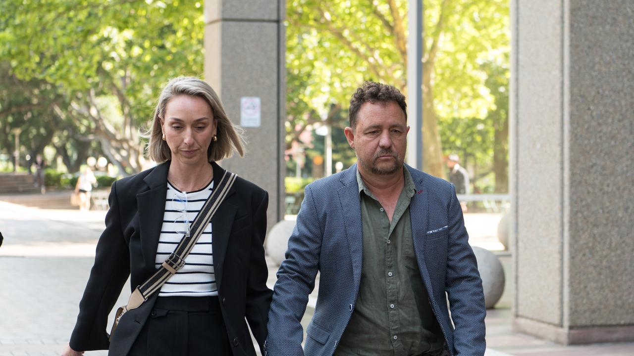 Brittany Higgins' father Matthew Higgins (right) and his partner Kelly Jago (left) leaving the Federal court in Sydney on Monday. Picture: NCA NewsWire / Flavio Brancaleone