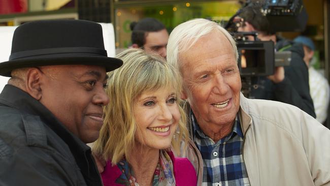 Reggie VelJohnson, Olivia Newton John and Paul Hogan in a scene from The Very Excellent Mr Dundee.