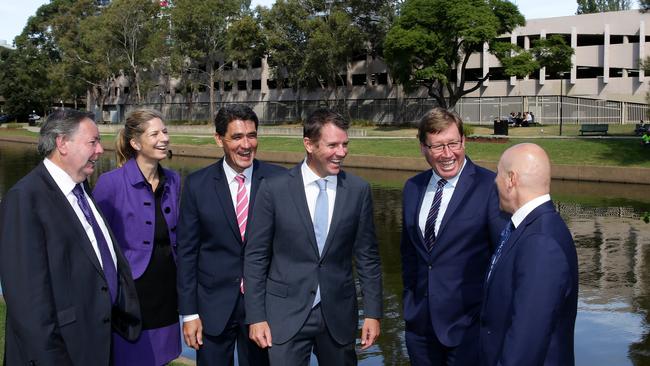 Former Parramatta Lord Mayor Paul Garrard, Dolla Merrillees, Director of the Powerhouse Museum, Parramatta MP Geoff Lee, NSW Premier and Minister for Western Sydney Mike Baird, Deputy Premier and Minister for the Arts Troy Grant and former Parramatta Deputy Lord Mayor Bakous Makari at the preferred location for Parramatta’s new Powerhouse Museum. Picture: Jonathan Ng