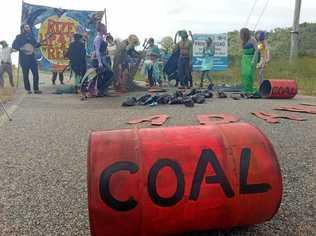 Protesters dressed as dead fish and Ursula from The Little Mermaid on the Abbot Point Coal Terminal access road.