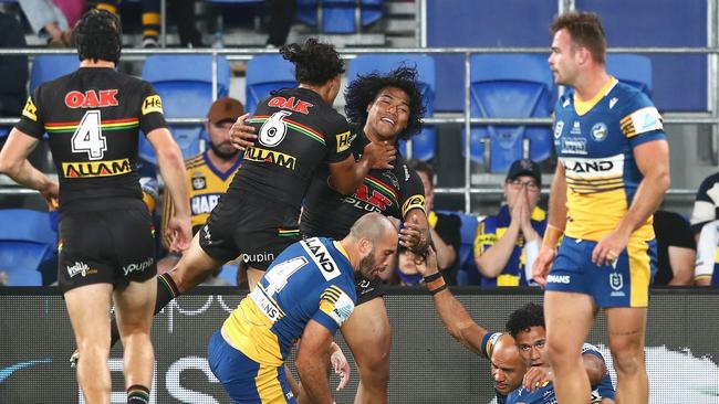 Brian To’o celebrates with Jarome Luai after scoring one of his three tries against the Eels. Picture: Chris Hyde/Getty Images