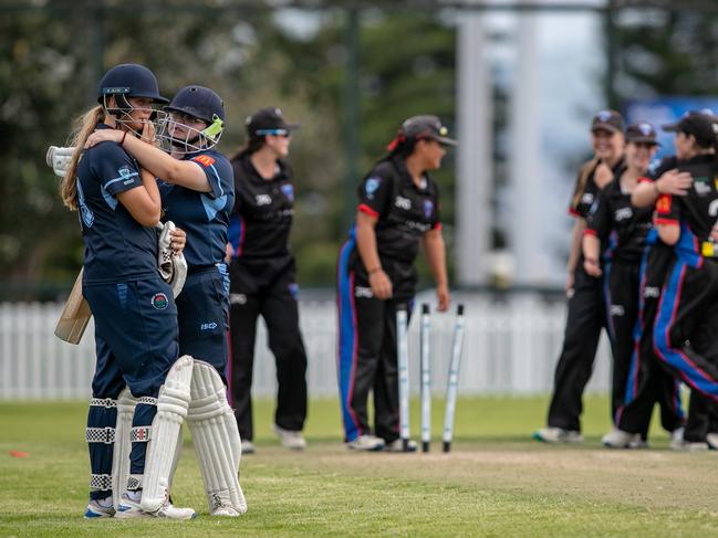 Manly’s Lily Crabbe consoles her distraught teammate Sonia Punter at the end of the game. Picture: Julian Andrews