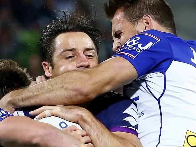 Round 6 - Melbourne Storm v Canterbury Bulldogs, at AAMI Park, Cooper Cronk tackled high by Josh Reynolds with no penalty. 11th April 2016. Picture: Colleen Petch.