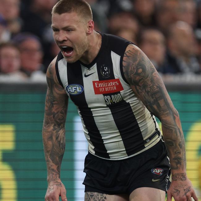 Jordan De Goey reacts after suffering a hamstring injury during the third quarter of the three-point win over Carlton. Picture: Daniel Pockett / Getty Images