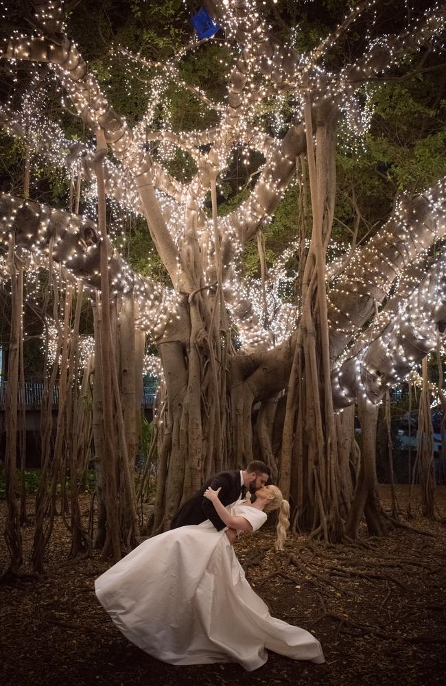 Lauren Knaggs and Jonathon Beck under the fairy lights on their wedding day. Pictures: Don't Say Cheese