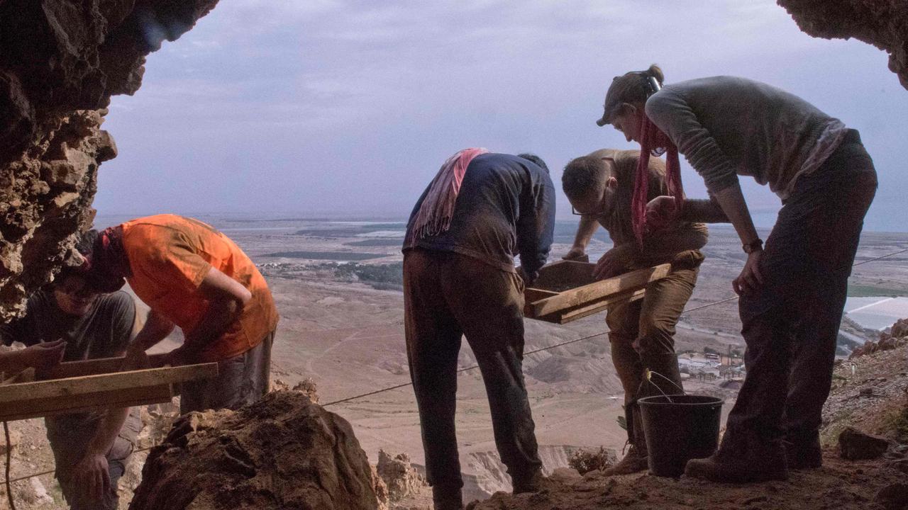 Archaeologists found the new fragments in the ‘Cave of Horror’. Picture: Shai Halevi/Israeli Antiquities Authority/AFP