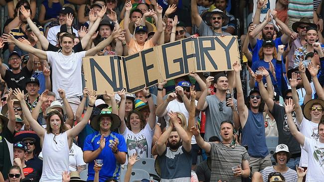 A ‘Nice Garry’ sign in the crowd this summer supporting Nathan Lyon. Picture: Wayne Ludbey