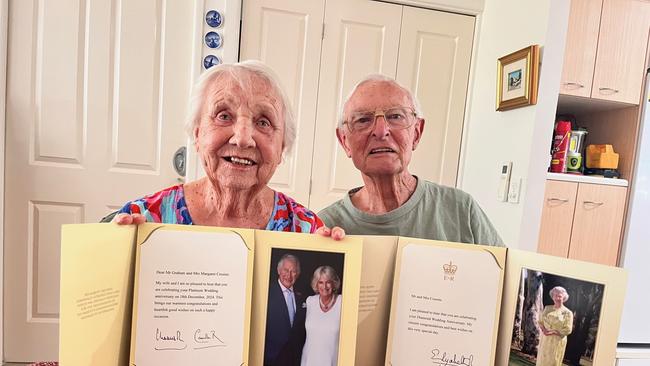 Cairns couple Margaret and Graham Cossins received letters from Queen Elizabeth I and King Charles III to celebrate their 50th and 70th wedding anniversaries, respectively. Photo: Supplied.