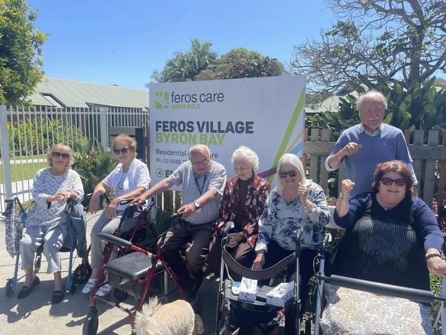 Happy Feros Village Byron Bay residents from left: Charmian Podesta, Sybil Reddan, Mick Eddings, Kate Smorty, Bernadette Dean, Rhonda Strand, and Henning Jensen.