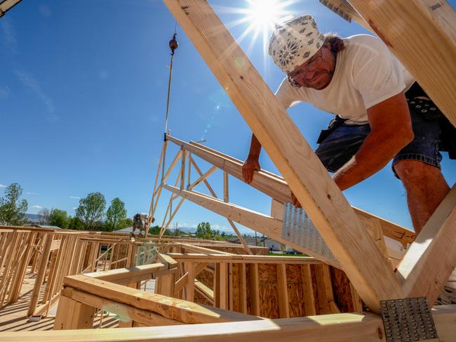 Drone View of a Home being Framed by Carpenters