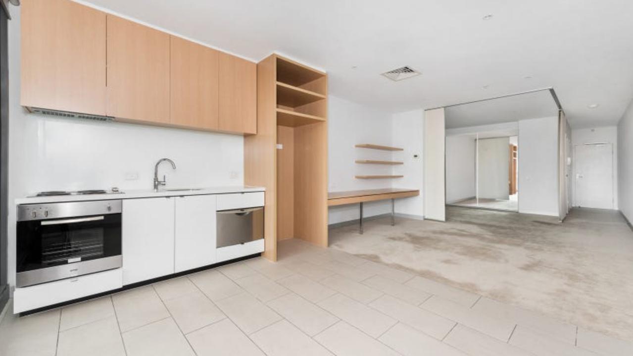 A one-bedroom apartment at 722/555 Flinders St, Melbourne, is advertised at $520 a week, with rents surging across most of the city despite an improving vacancy rate.