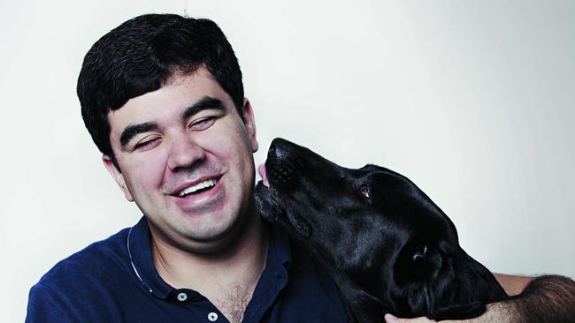 Santiago Velasquez with guide dog Lockie. Pic: Justine Walpole