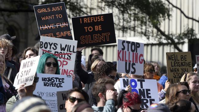 Thousands gather outside the State Library for the national rally against gender based violence. Picture: Andrew Henshaw