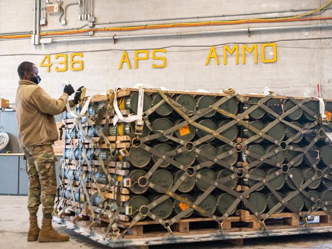 Airmen and civilians from the 436th Aerial Port Squadron palletise ammunition, weapons and other equipment bound for Ukraine during a foreign military sales mission at Dover Air Force Base, Delaware. Picture: US Airforce / AFP