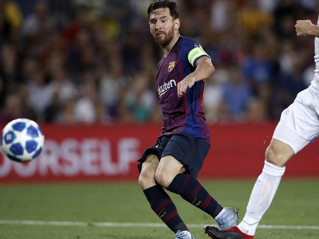 Barcelona forward Lionel Messi scores his side's fourth goal during the group B Champions League soccer match between FC Barcelona and PSV Eindhoven at the Camp Nou stadium in Barcelona, Spain, Tuesday, Sept. 18, 2018. (AP Photo/Manu Fernandez)