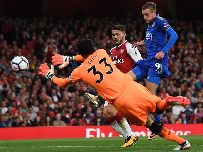 Jamie Vardy of Leicester City scores his team's second goal past goalkeeper Petr Cech.