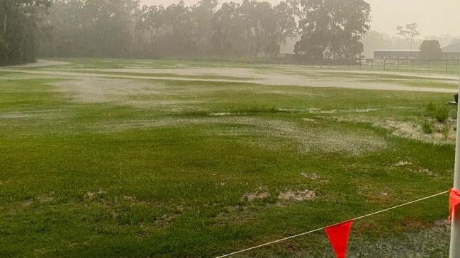 The Champions Church back yard during some rain last year. Faith Lutheran College in the background. Picture: Contributed