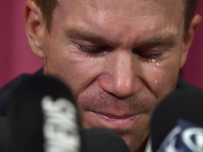 Australian cricketer David Warner cries during a press conference over his role in the ball-tampering affair.