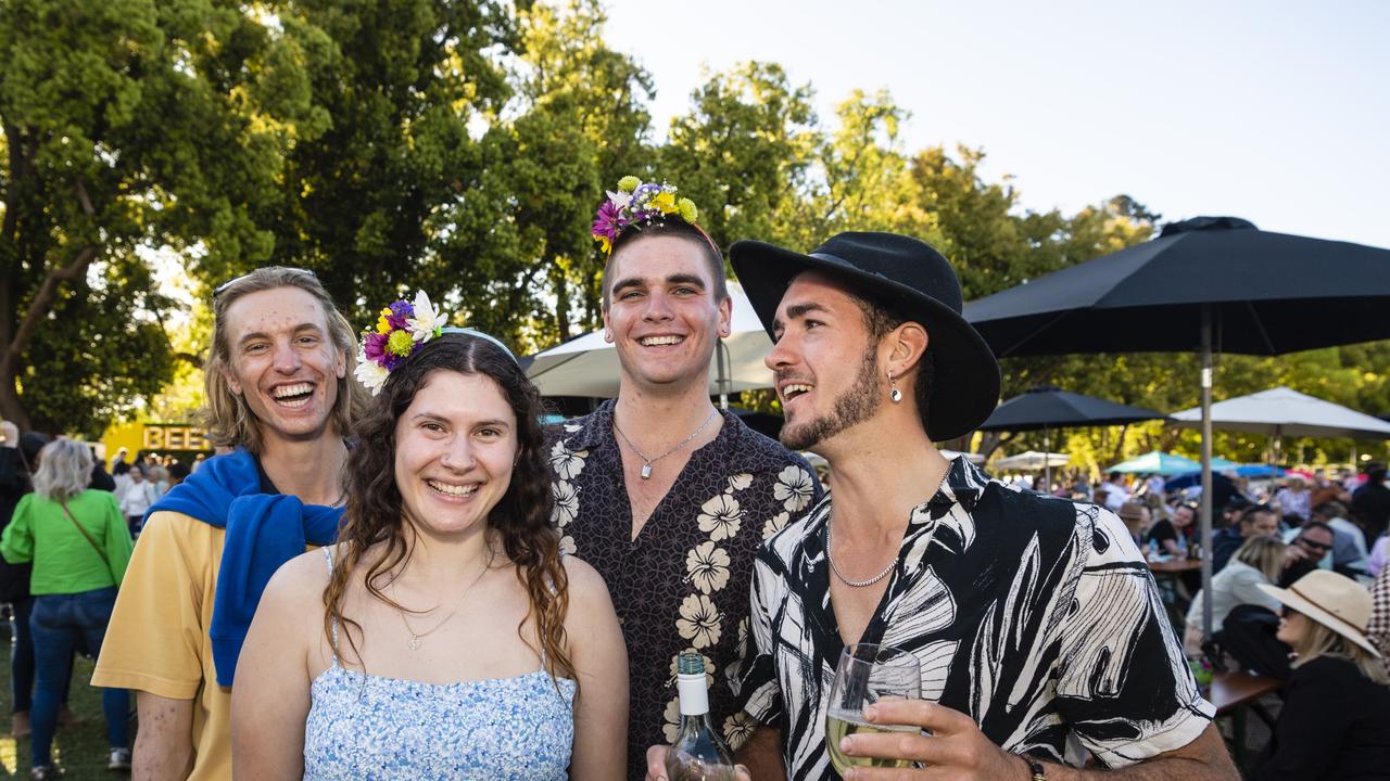 Enjoying the Festival of Food and Wine are (from left) Bryden Schultz, Rose Collier, Leo Hancock and Kahil Harwood, Carnival of Flowers 2022, Saturday, September 10, 2022. Picture: Kevin Farmer