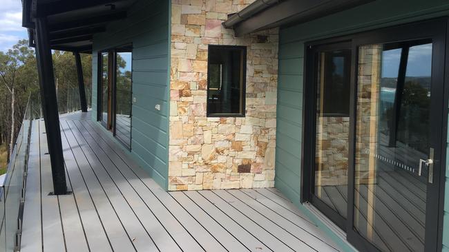 Fire-resistant decking can be attractive. Kate Cotter's home at Big Hill, southern Victoria.