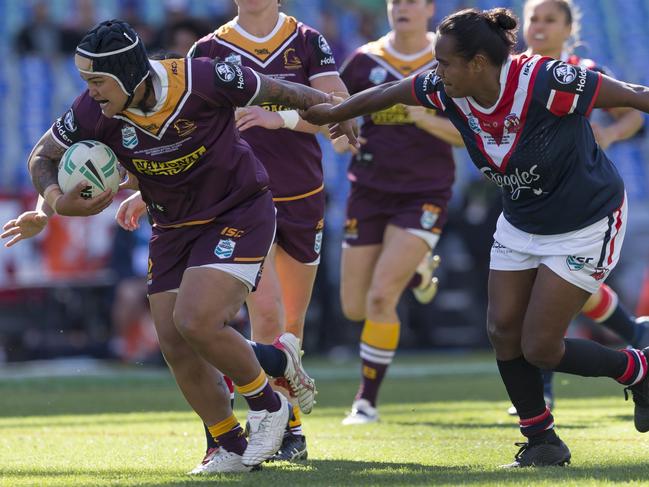 Rona Peters of the Broncos is tackled during the NRL Women's Premiership Grand Final between the Brisbane Broncos and the Sydney Roosters at ANZ Stadium in Sydney, Sunday, September 30, 2018. (AAP Image/Craig Golding) NO ARCHIVING, EDITORIAL USE ONLY