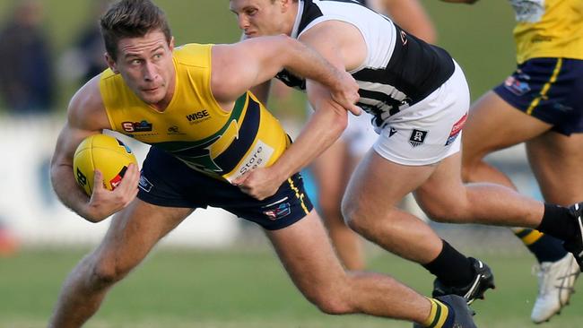 SANFL  Eagles versus Port Adelaide at Woodville Oval. Mitch Hardie under the pump from PortÃs Jack Strange. 12 June 2021. Picture Dean Martin