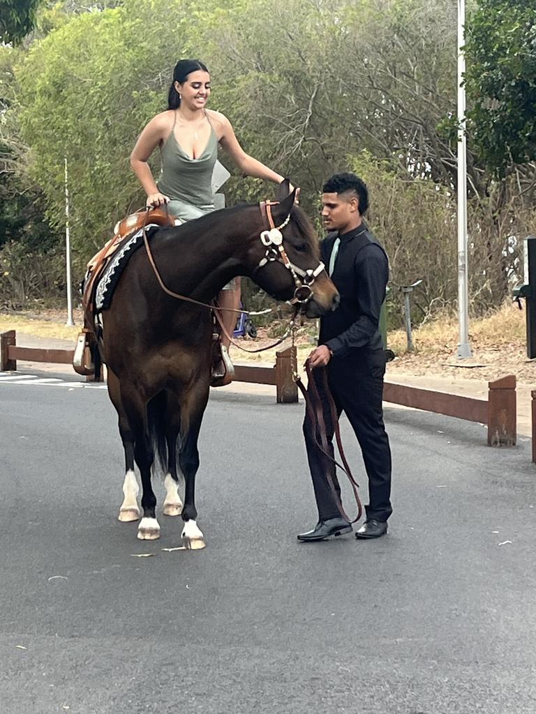 Lilly Hume and Elijah Mason arrive at the Hervey Bay State High School formal.