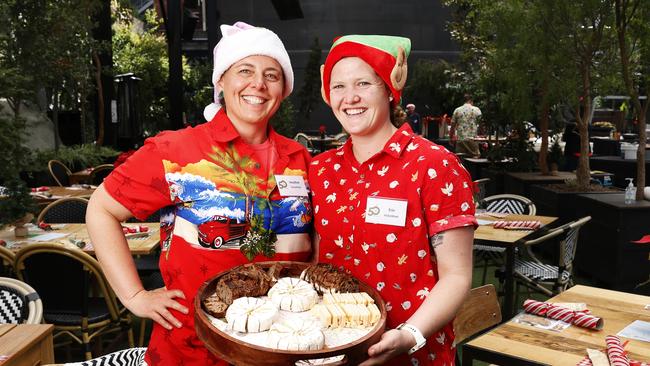 Volunteers Heather Davis-Schnierer with partner Erin Davis-Schnierer.  Colony47 Christmas Day lunch at In The Hanging Garden.  Picture: Nikki Davis-Jones